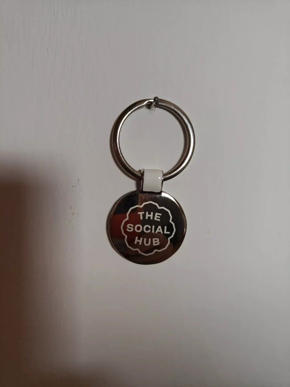 Un anno di pistakkio al the social hub florence belfiore 4 Portachiavi ufficiale in acciaio del welcome kit che viene dato ai nuovi ingressi nella membership presso il the social hub florence belfiore membership coworking firenze.
